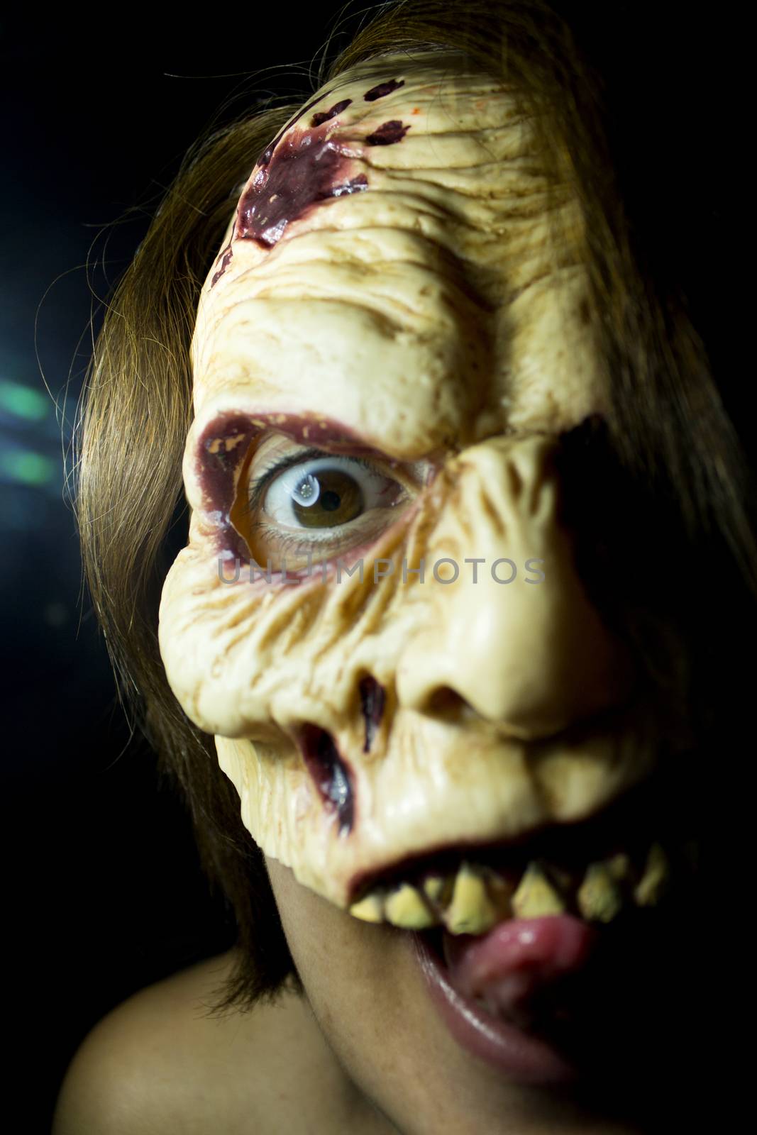 Portrait of a zombie woman at halloween party