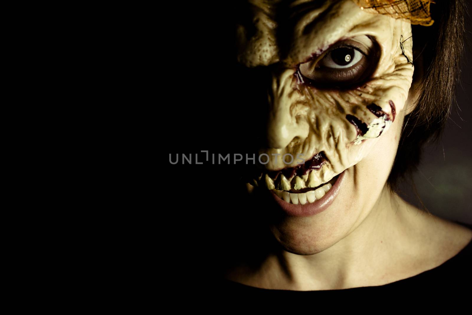 Portrait of a zombie woman at halloween party