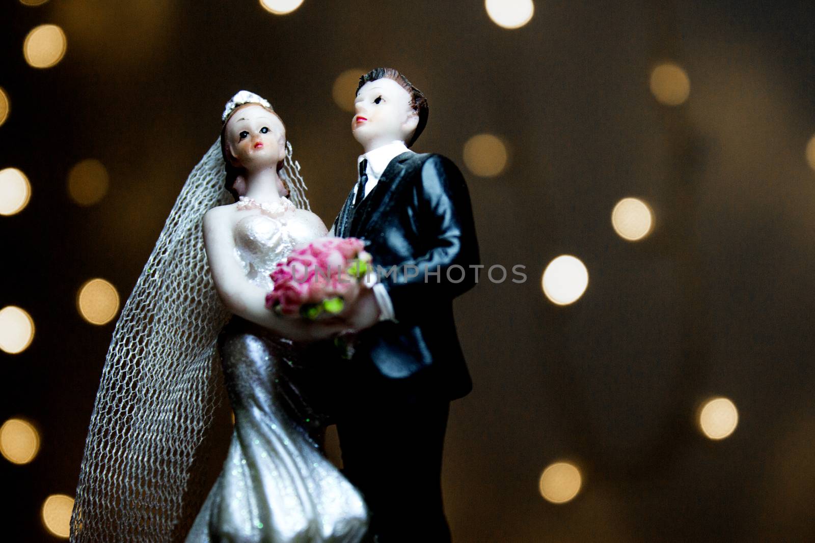 Figure of happy newlyweds. It does not have a specific author, it does not need model release