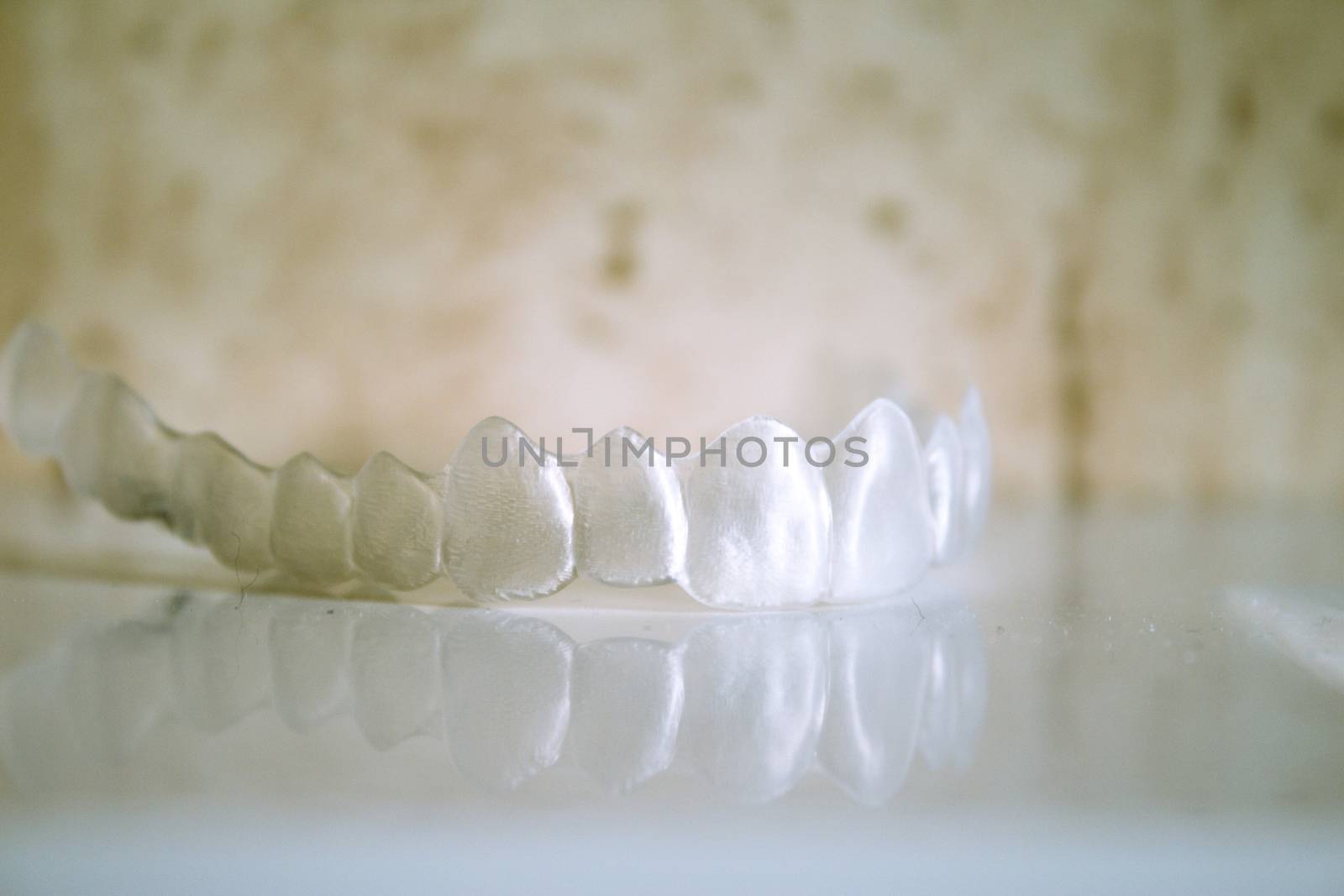 Invisible orthodontics reflected on the surface