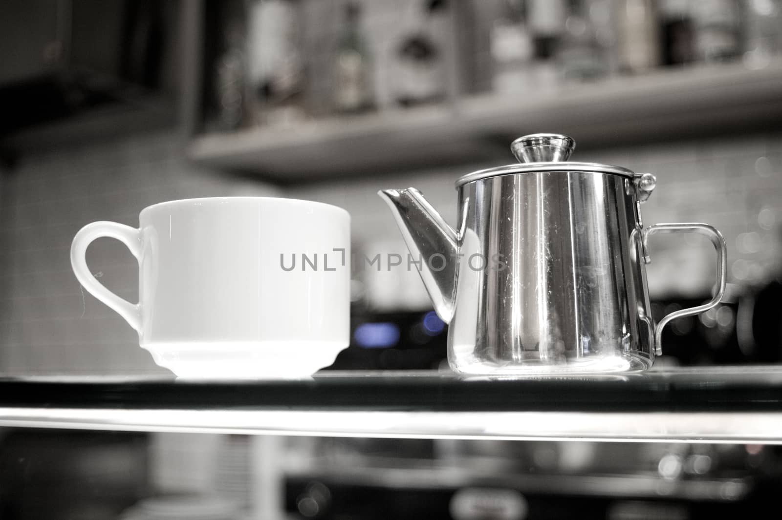 Whhite coffee cups on glass counter