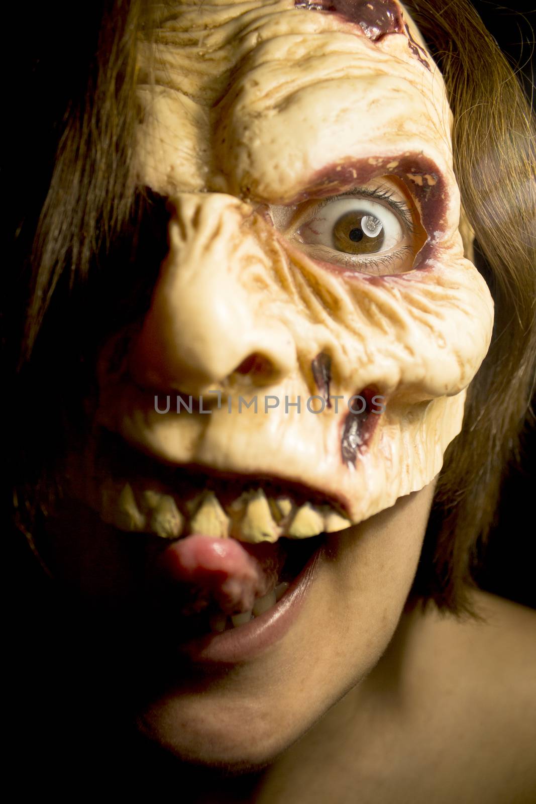 Portrait of a zombie woman at halloween party