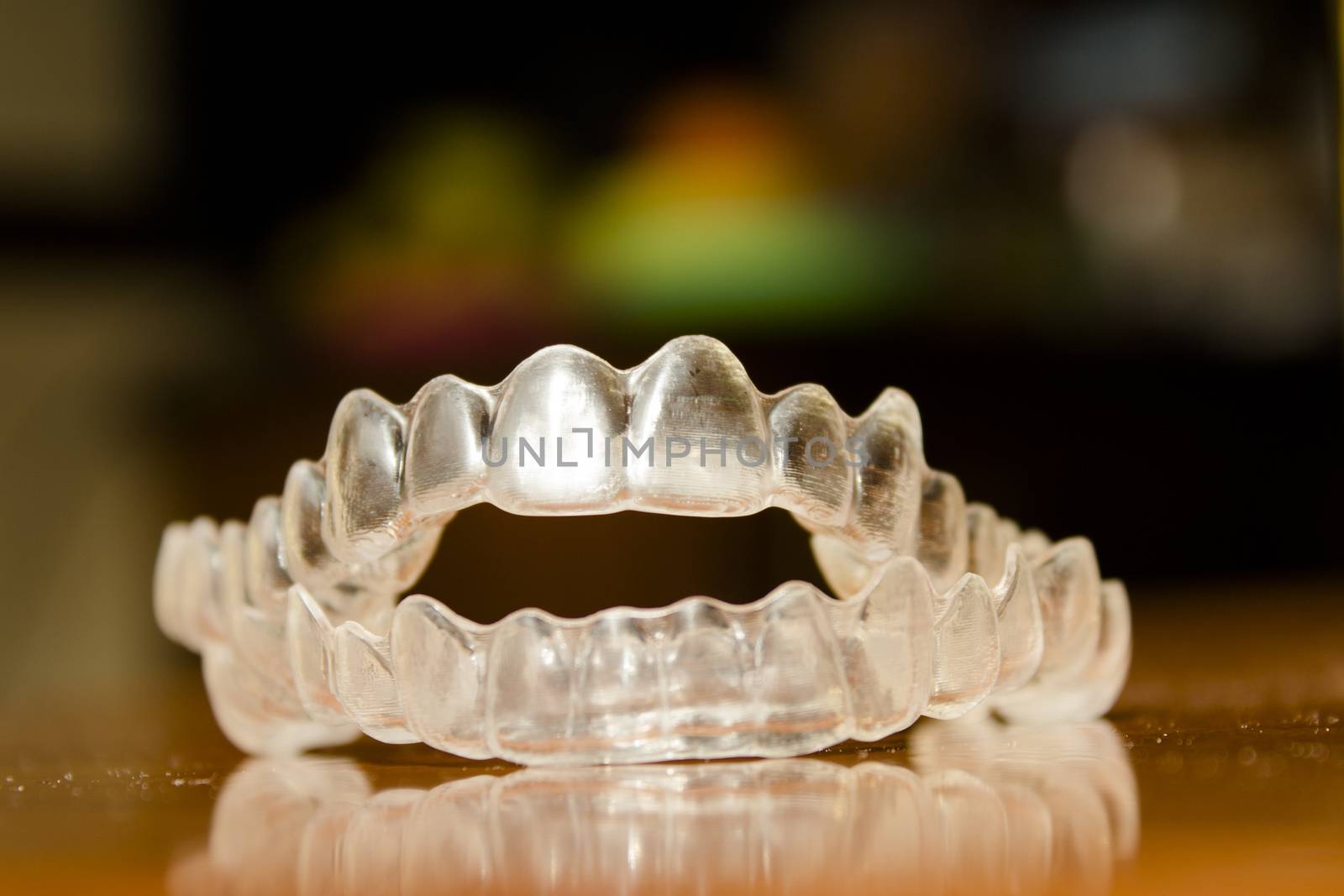 Invisible orthodontics to align the teeth