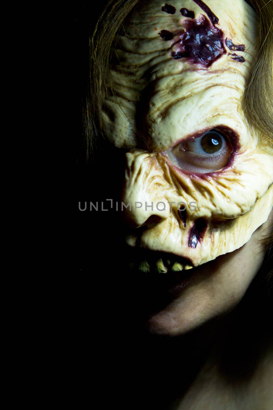 Portrait of a zombie woman at halloween party