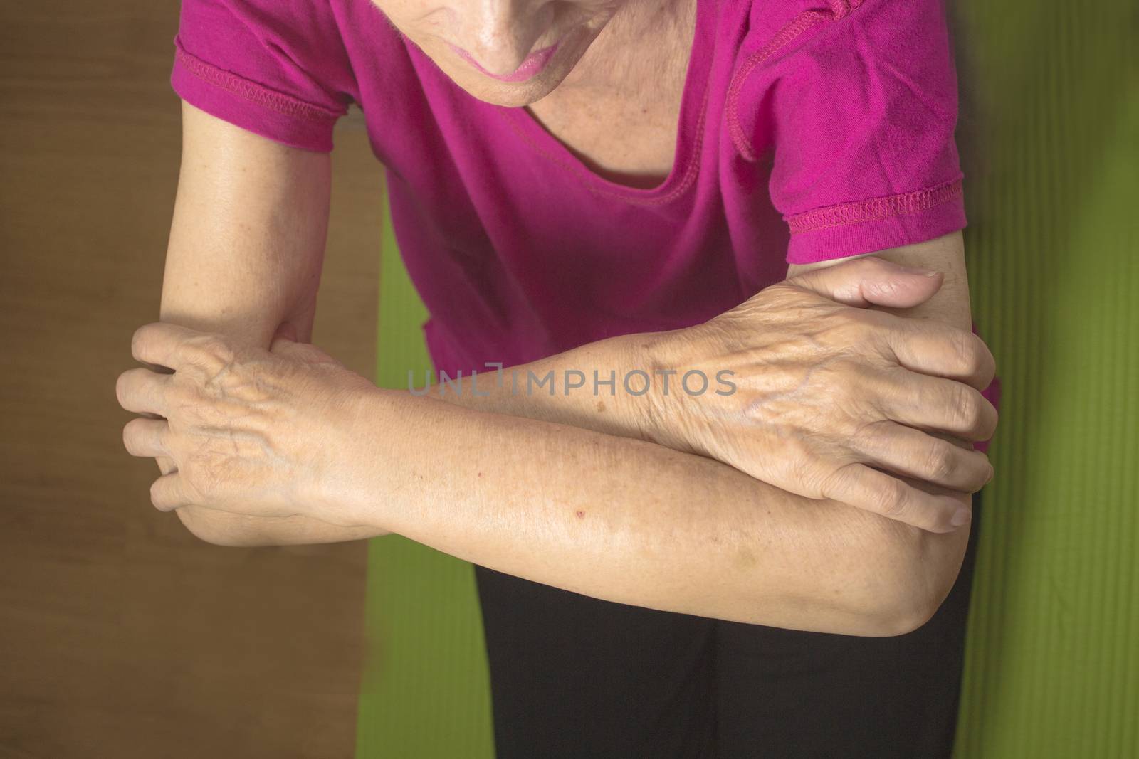 Rehabilitation exercises for an older woman with cerebral stroke