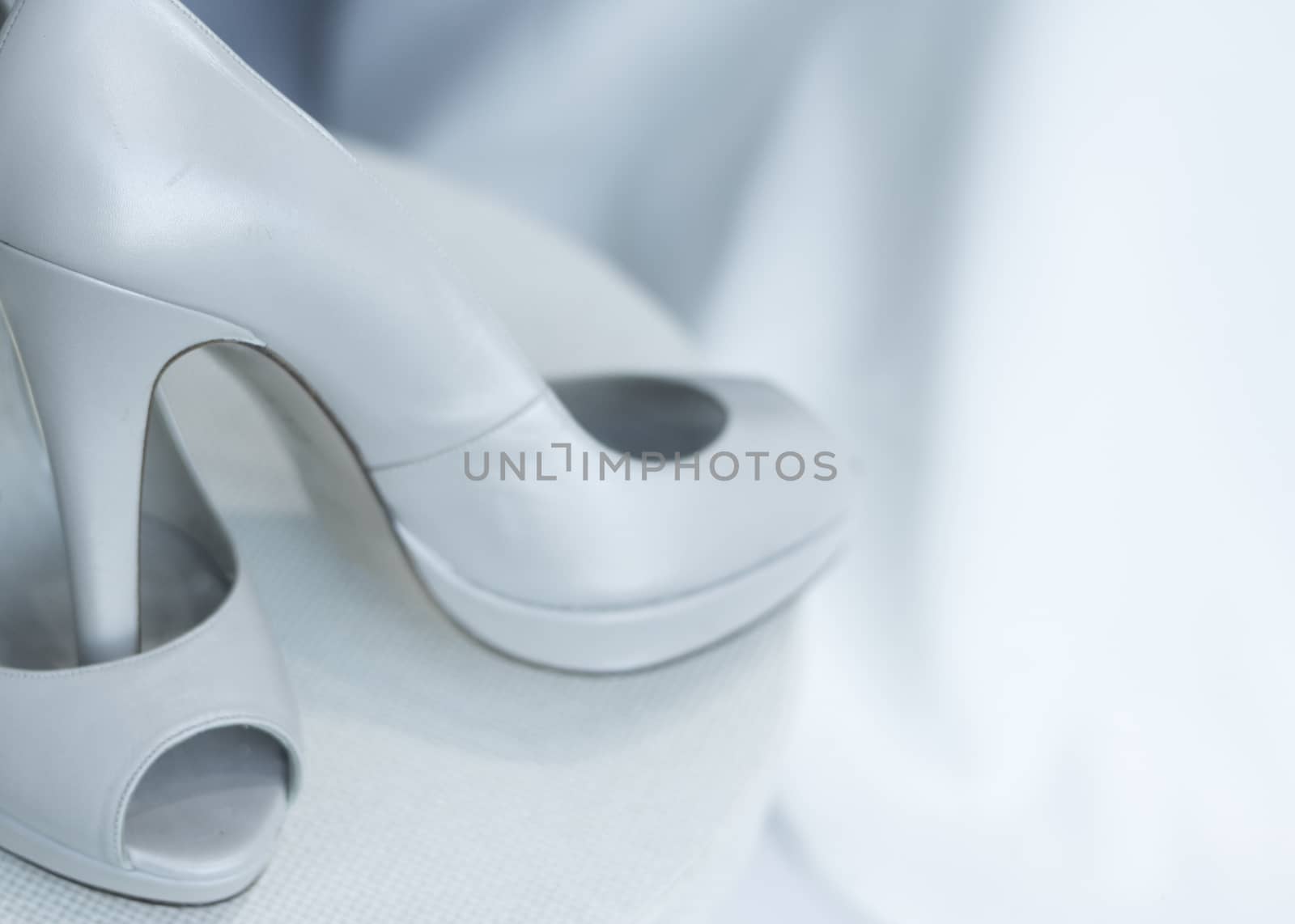 Generic white bridal shoes. No people