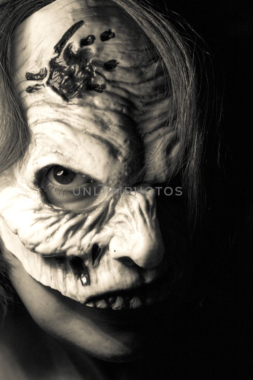 Portrait of a zombie woman at halloween party