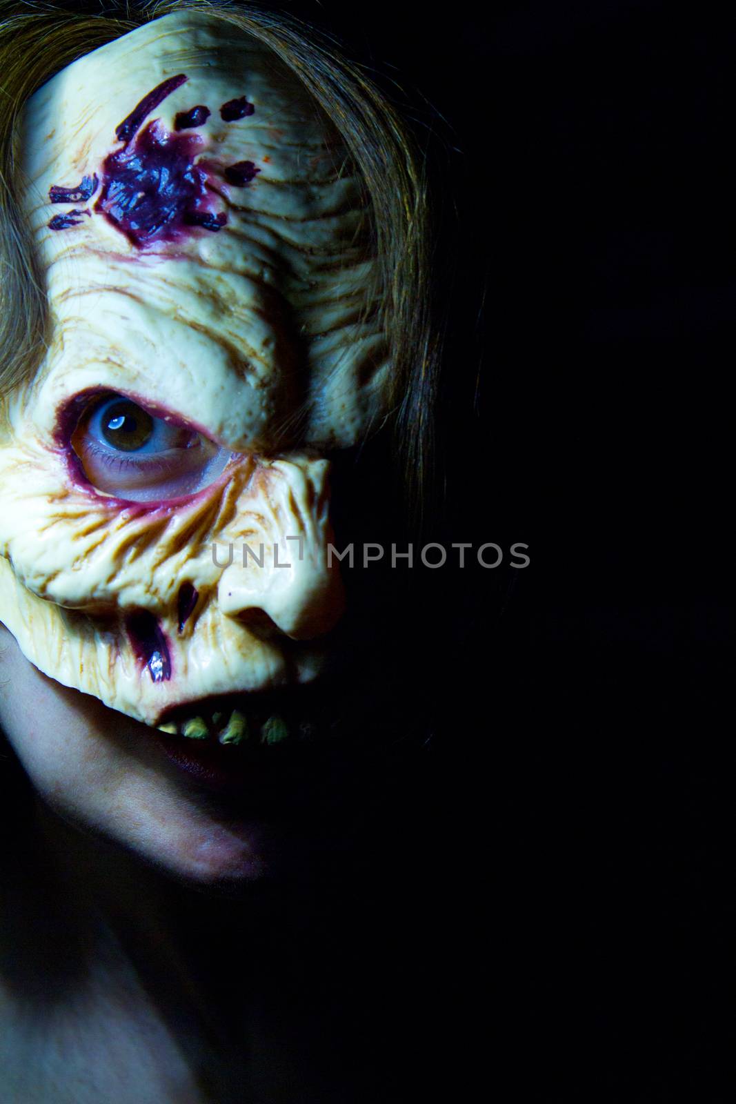 Portrait of a zombie woman at halloween party