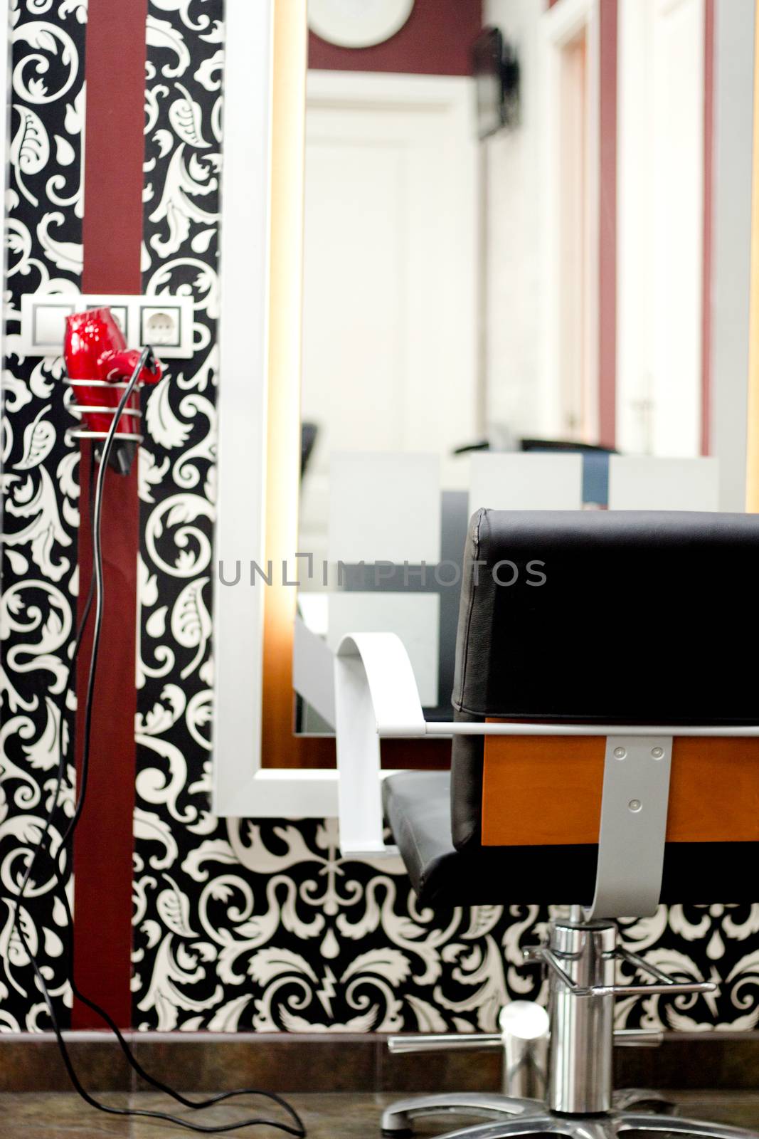 Part of a beauty salon with chairs for clients