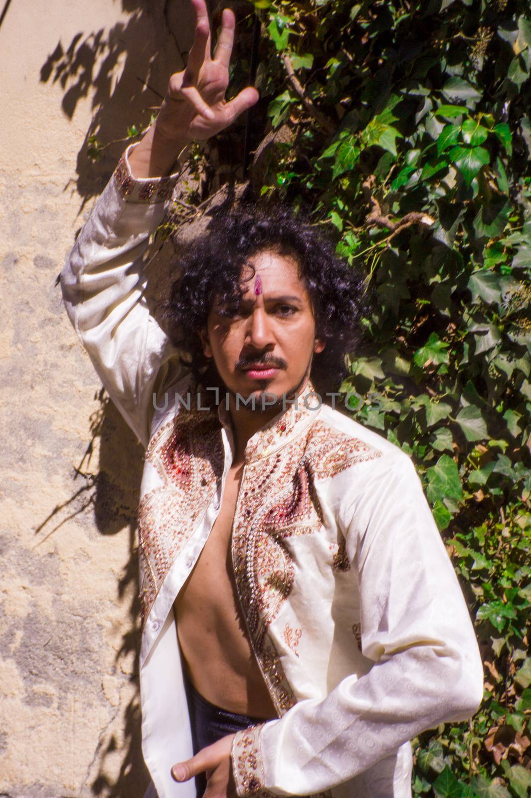 Bollywood dancer man over urban background