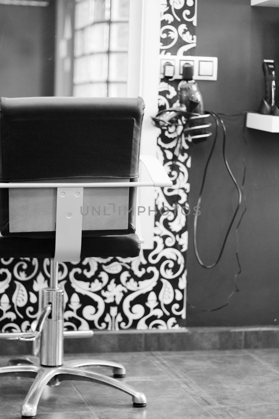 Part of a beauty salon with chairs for clients