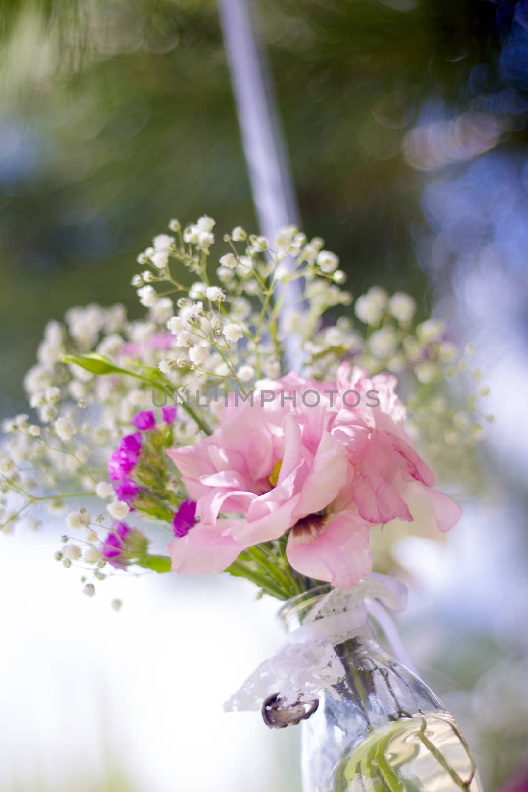 Outdoor wedding decoration with hanging flowers. No people.Copy space