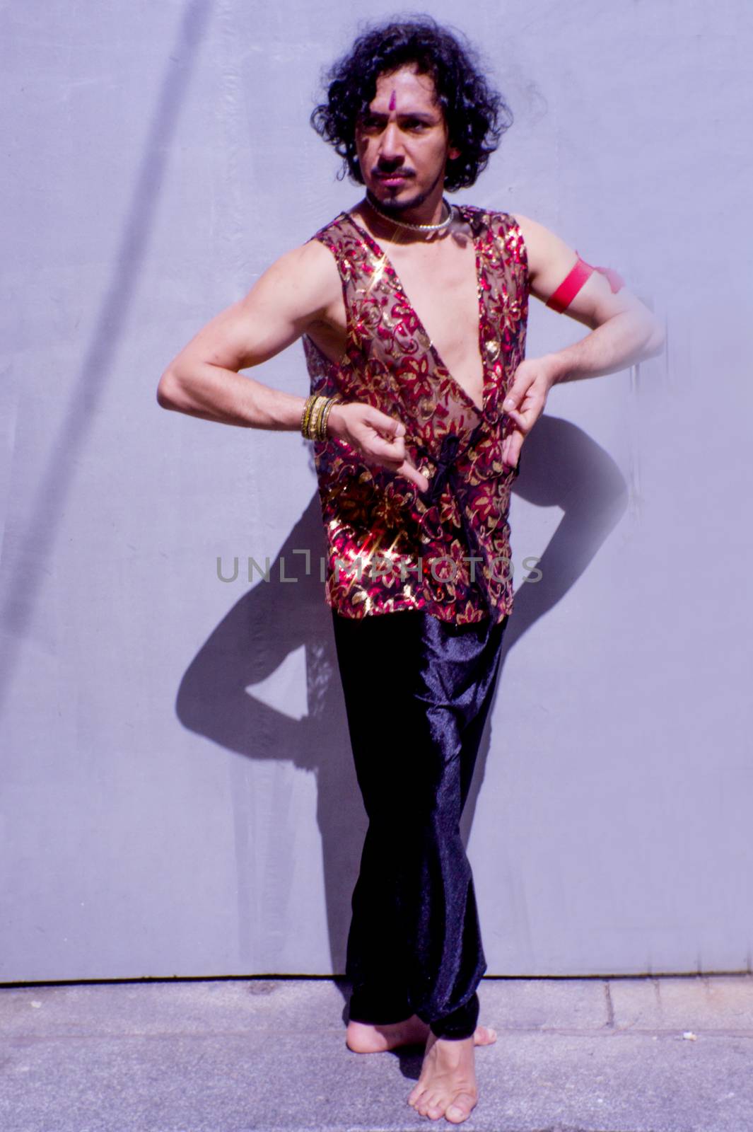 Bollywood dancer man over urban background