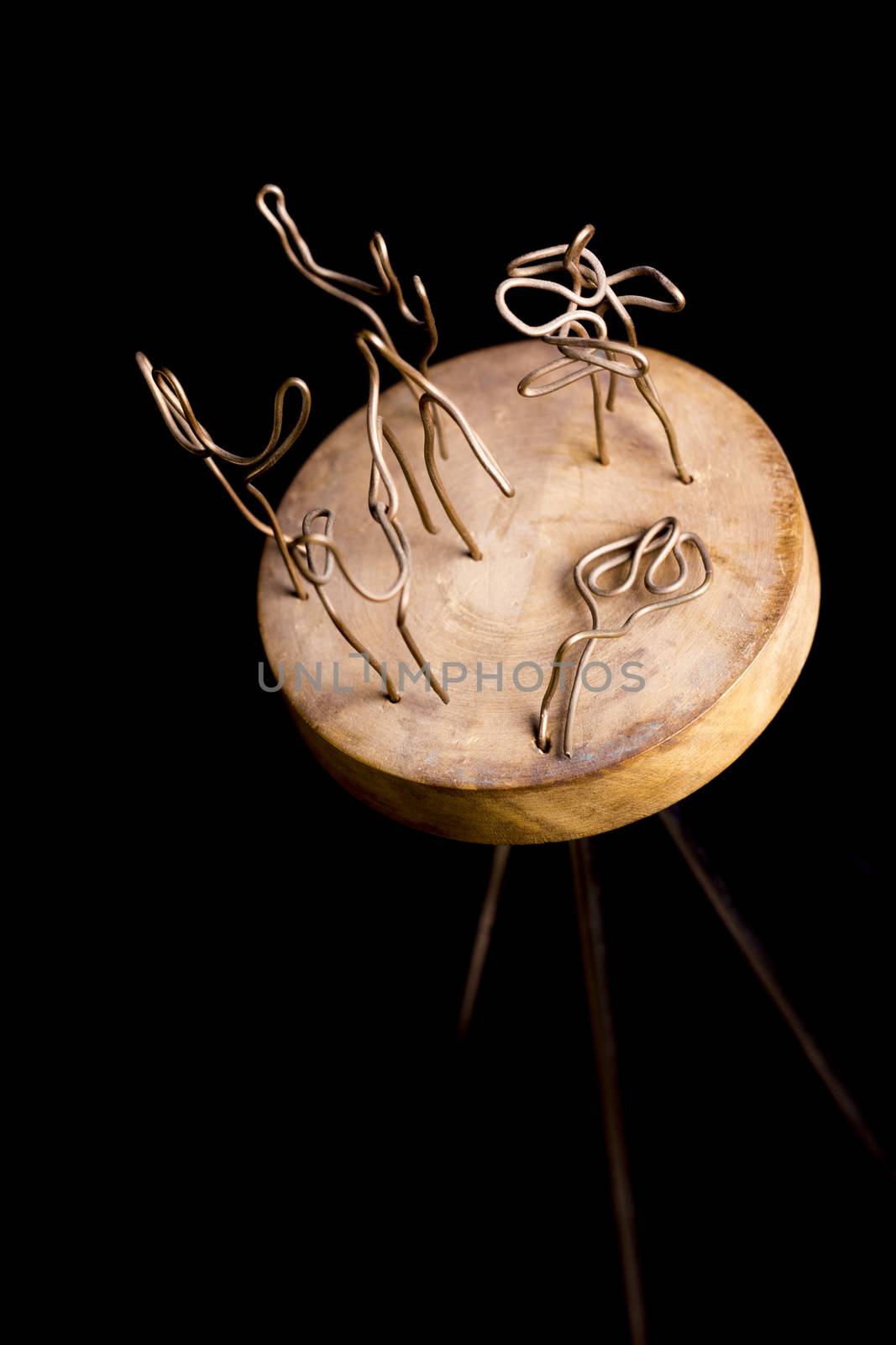 Modern sculpture made with recycled materials.  Similar to human emotions and gestures.
