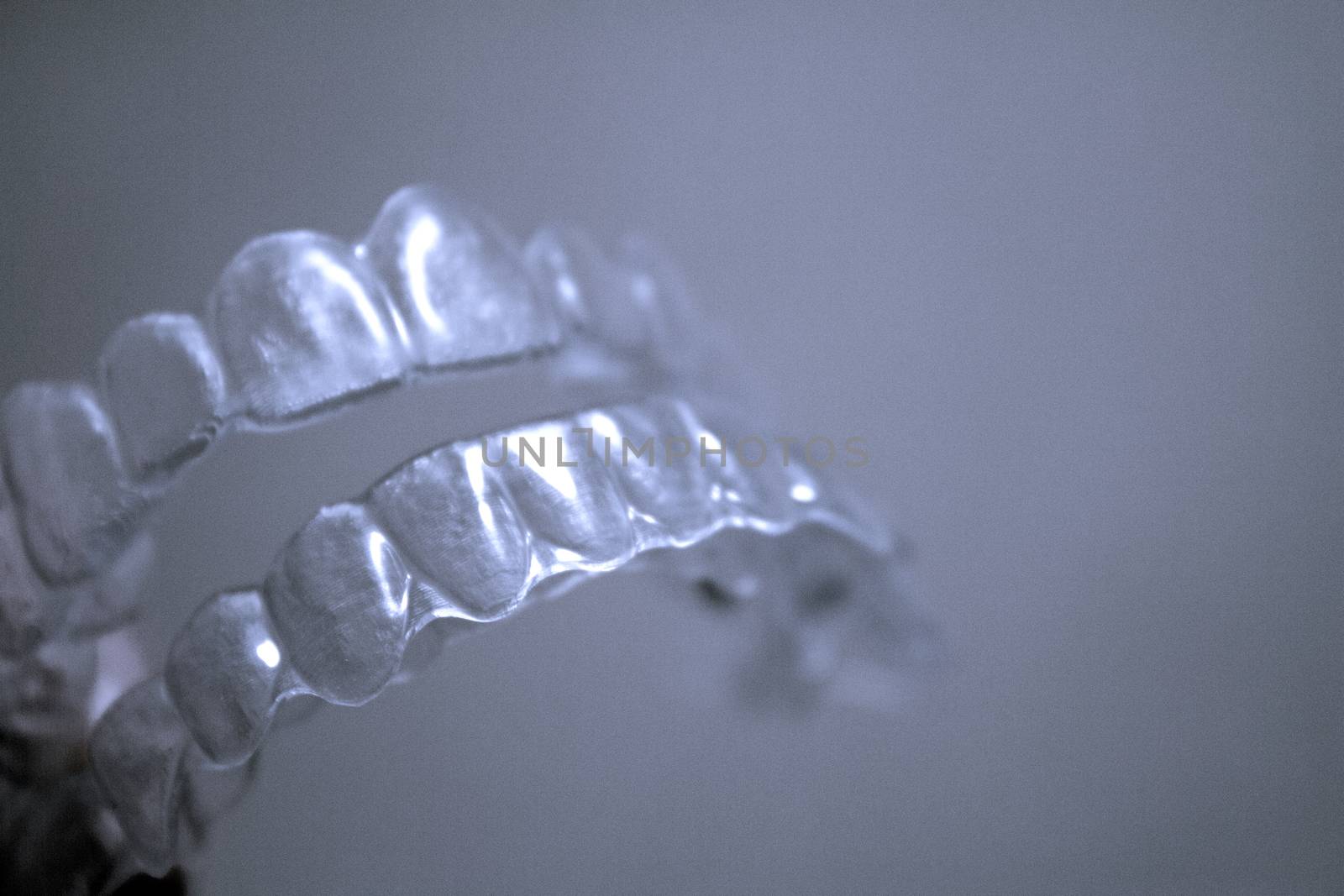 Transparent dental orthodontics to correct dental alignment. No people