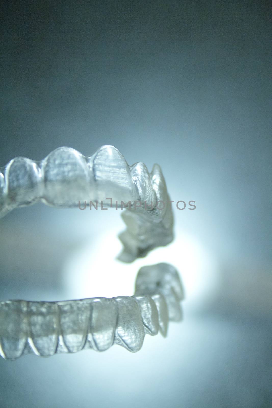 Transparent dental orthodontics to correct dental alignment. No people