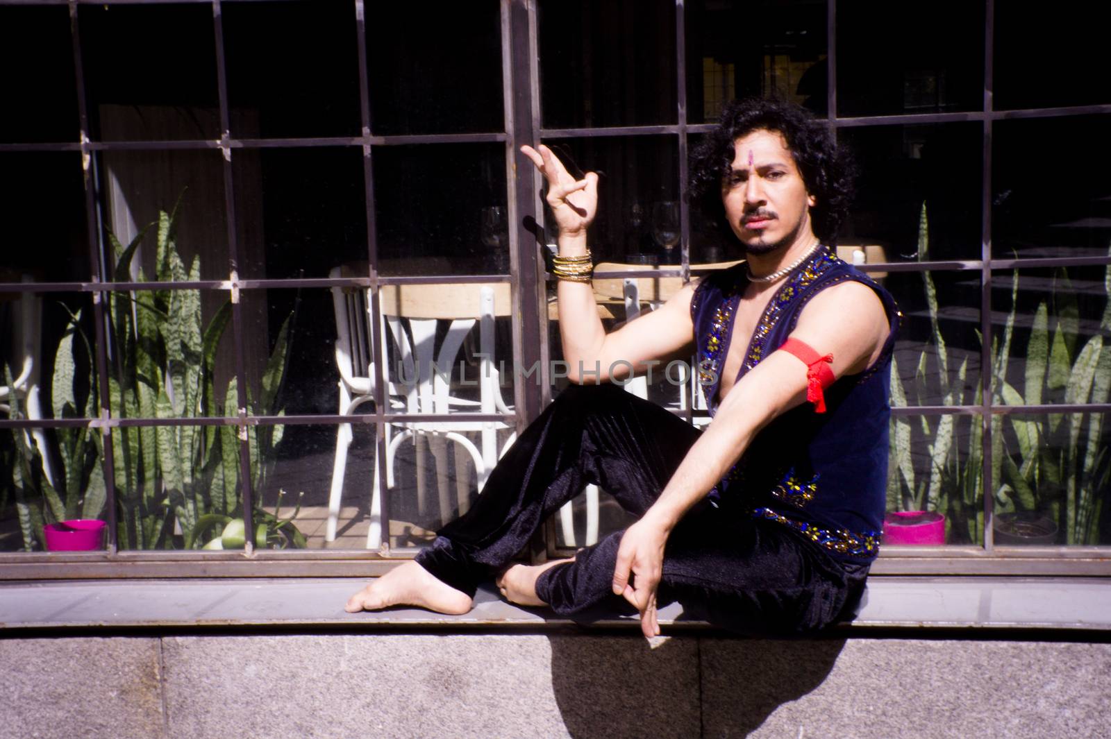 Bollywood dancer man over urban background