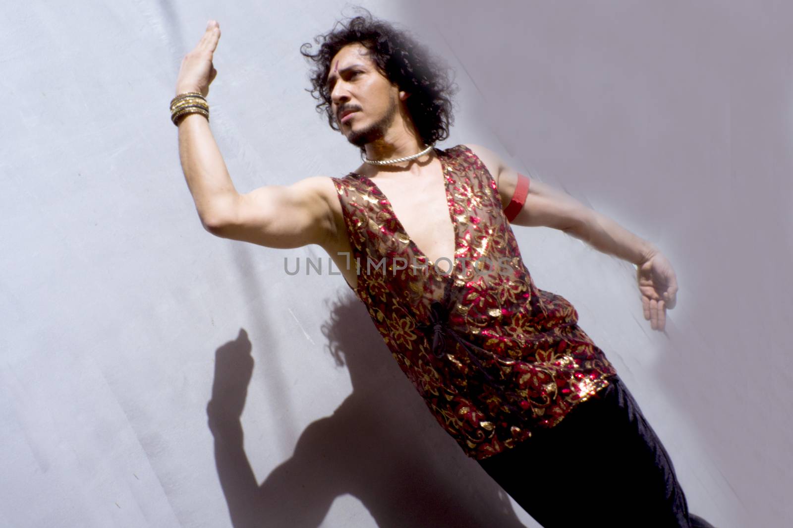 Bollywood dancer man over urban background