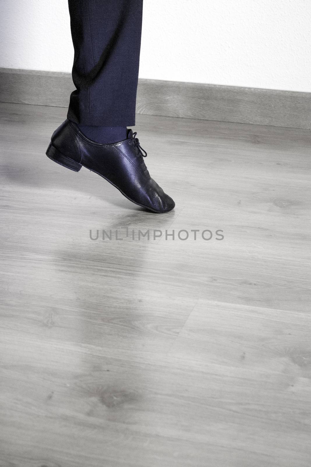 Feet dancer dancing salsa. Copy space