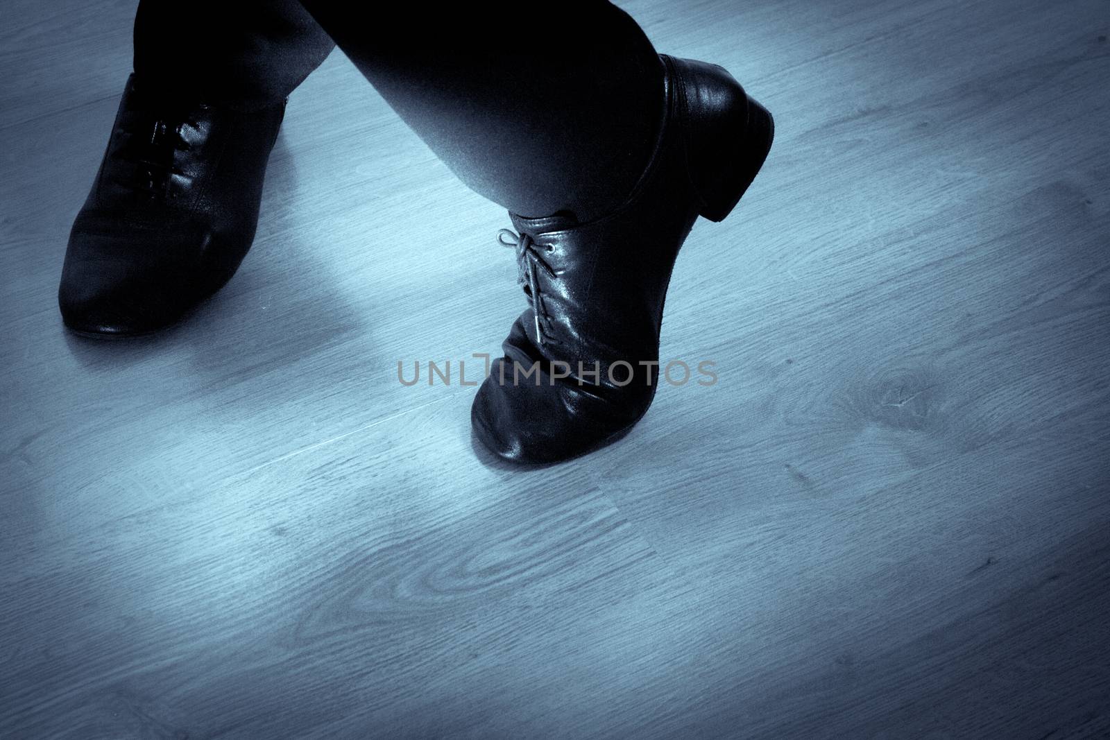 Feet dancer dancing salsa. Copy space