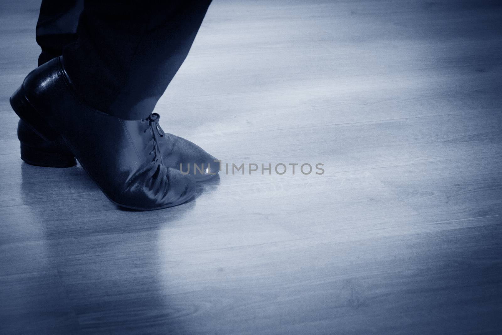 Feet dancer dancing salsa. Copy space