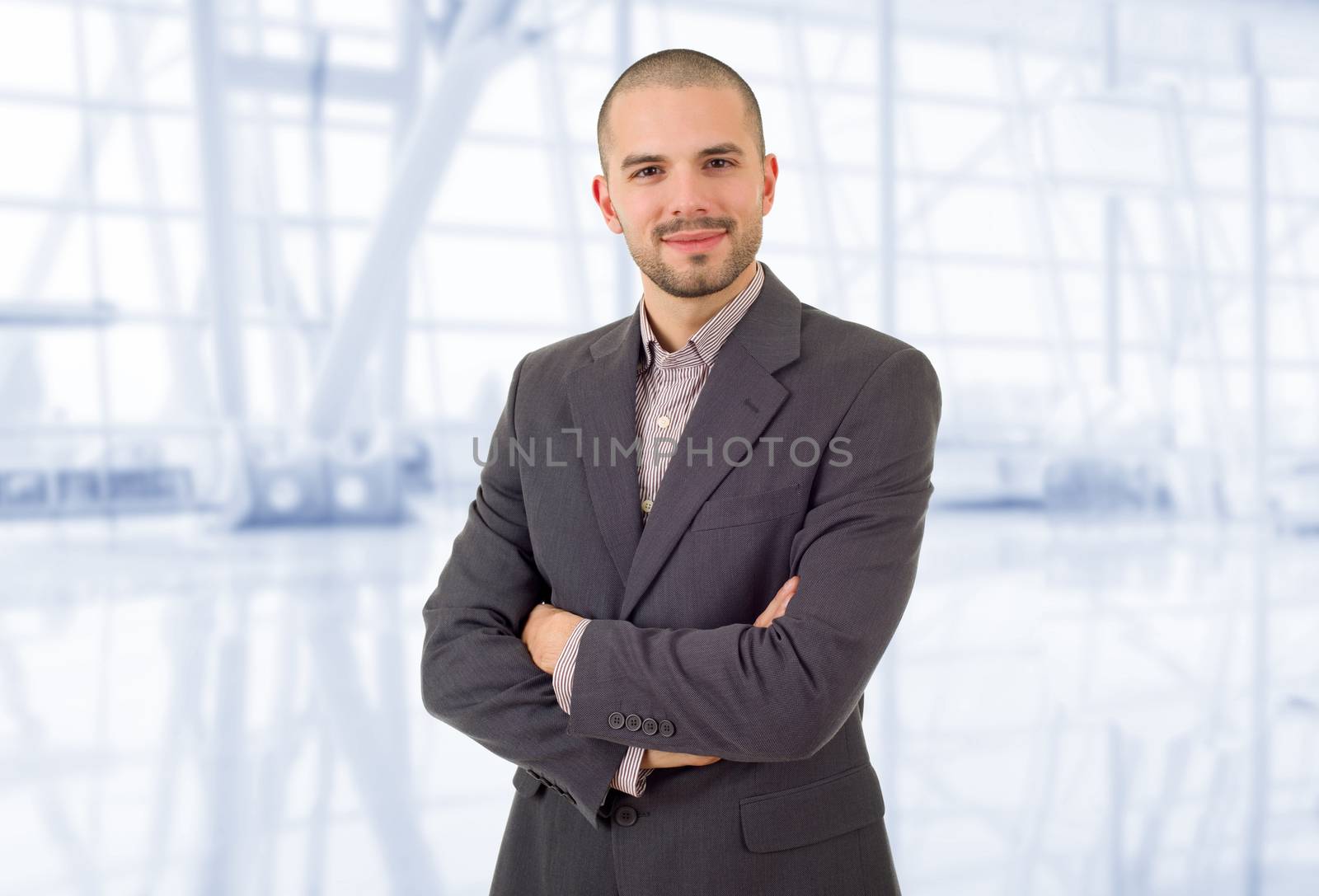 happy business man portrait at the office