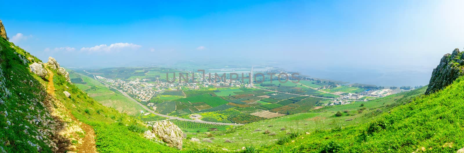Panoramic landscape view from Mount Arbel, with Migdal and the Sea of Galilee. Northern Israel