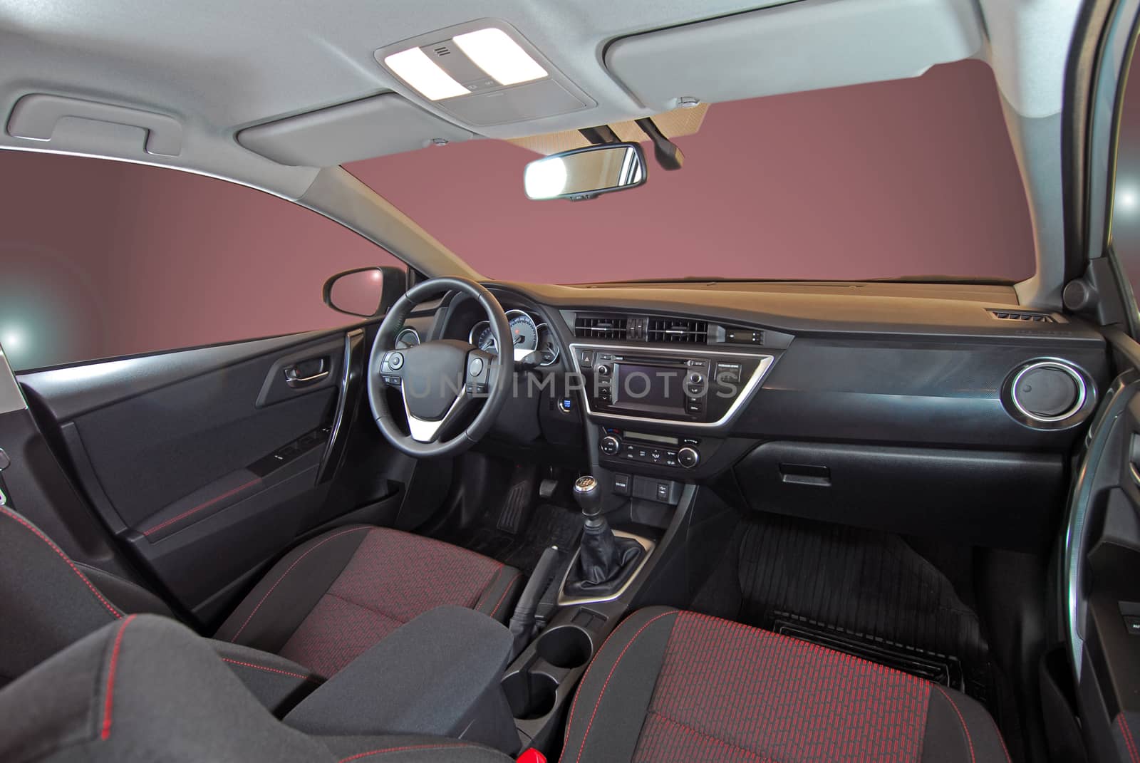 studio shot passenger car interior, front view