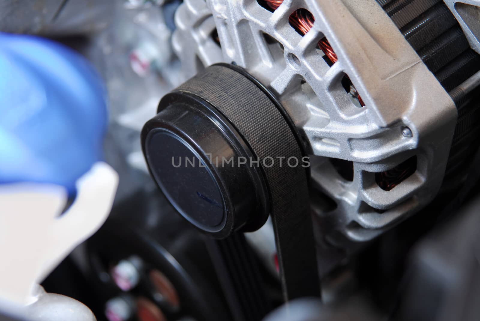 belt and pulley on the car alternator