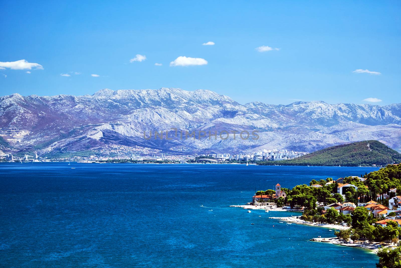 Landscape with the sea coast, mountains and city of Split in Croatia