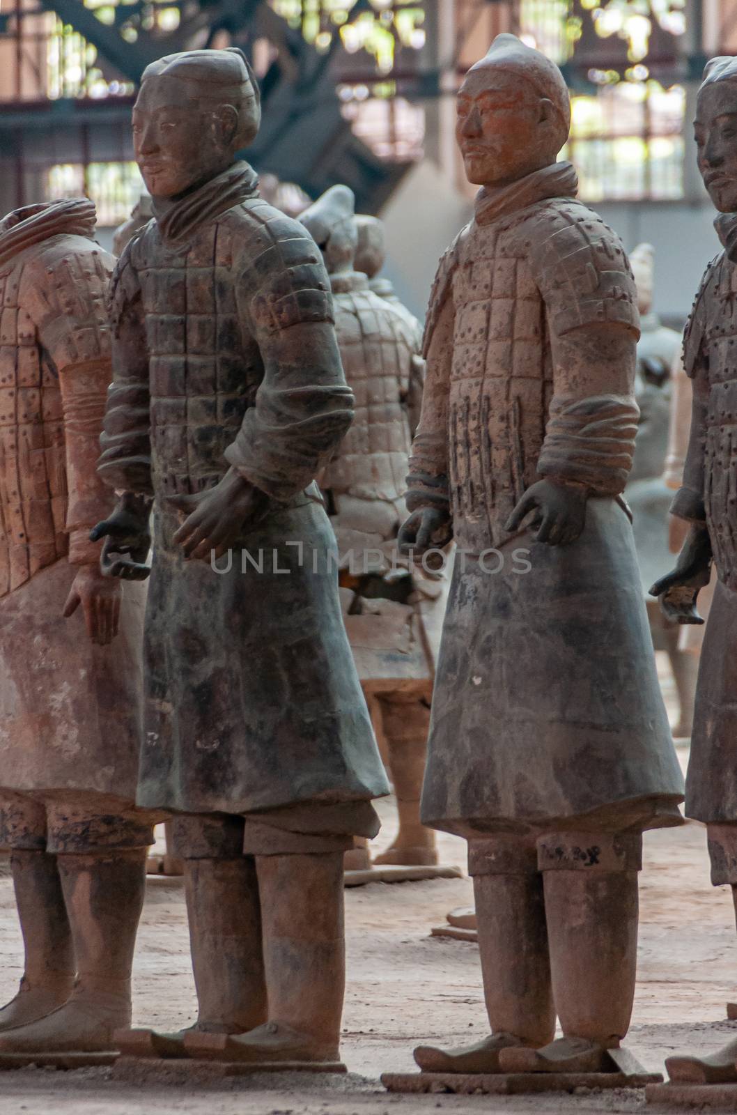 Full body closeup of soldiers at excavation in Terracotta Army m by Claudine