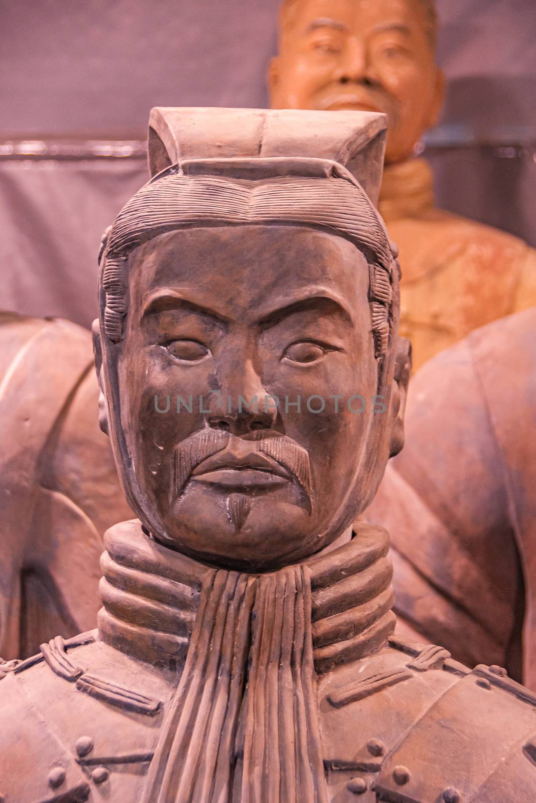 Officer head closeup at Terracotta Army museum, Xian, China. by Claudine