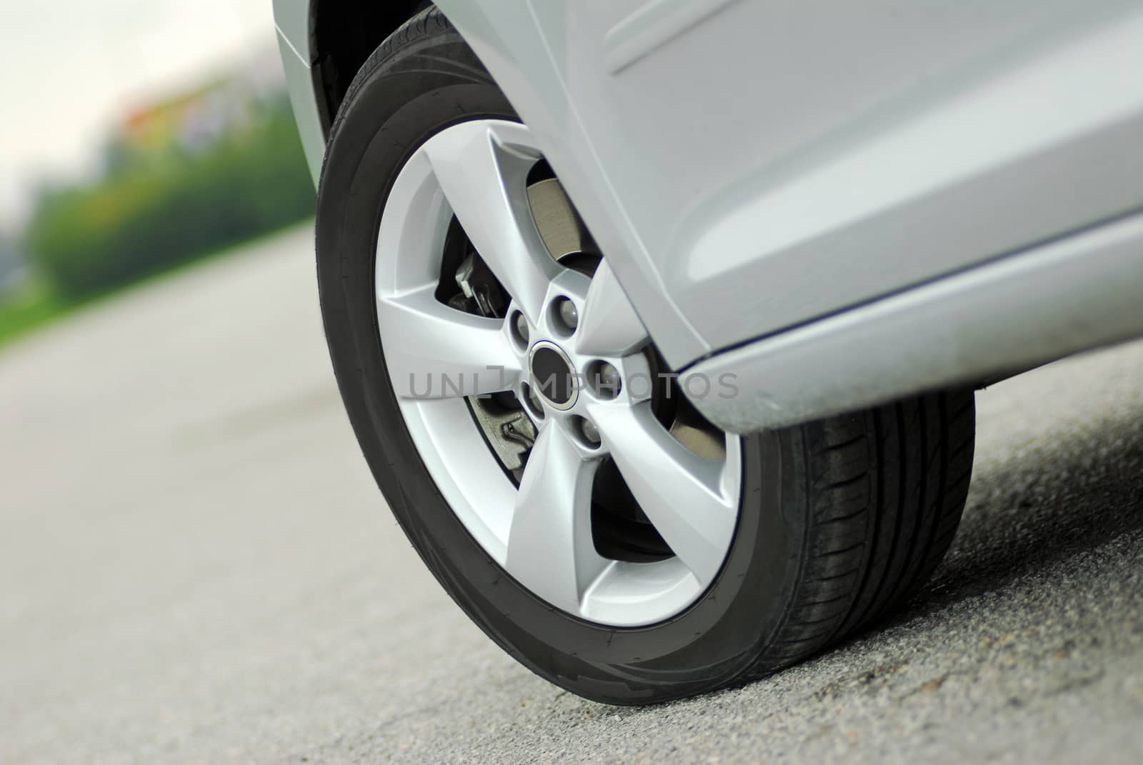 tire and alloy wheel on this passenger car