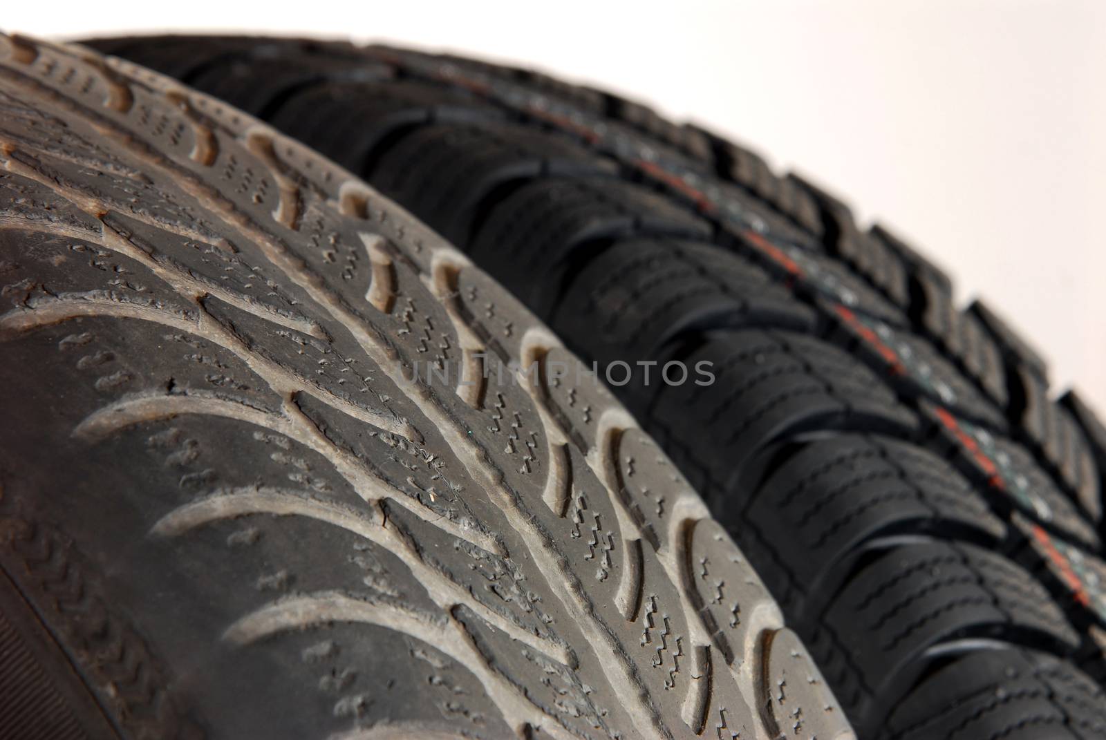 Fragment a old and new modern winter car tires