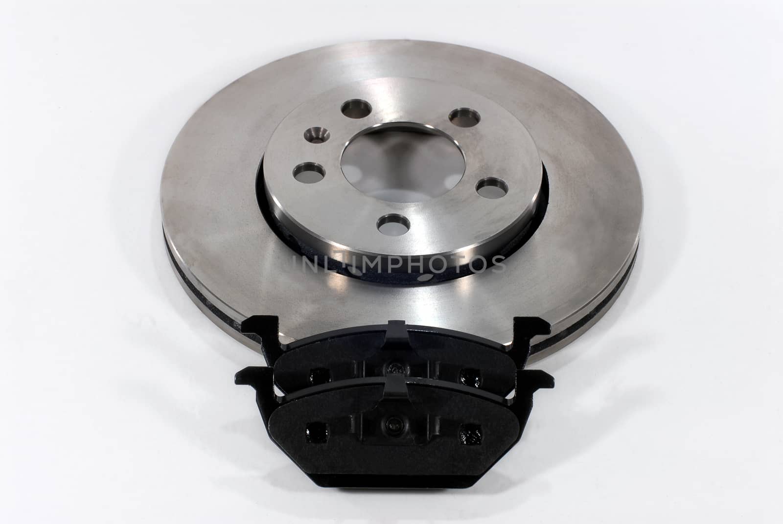 two brake pads and one new brake disc for the car