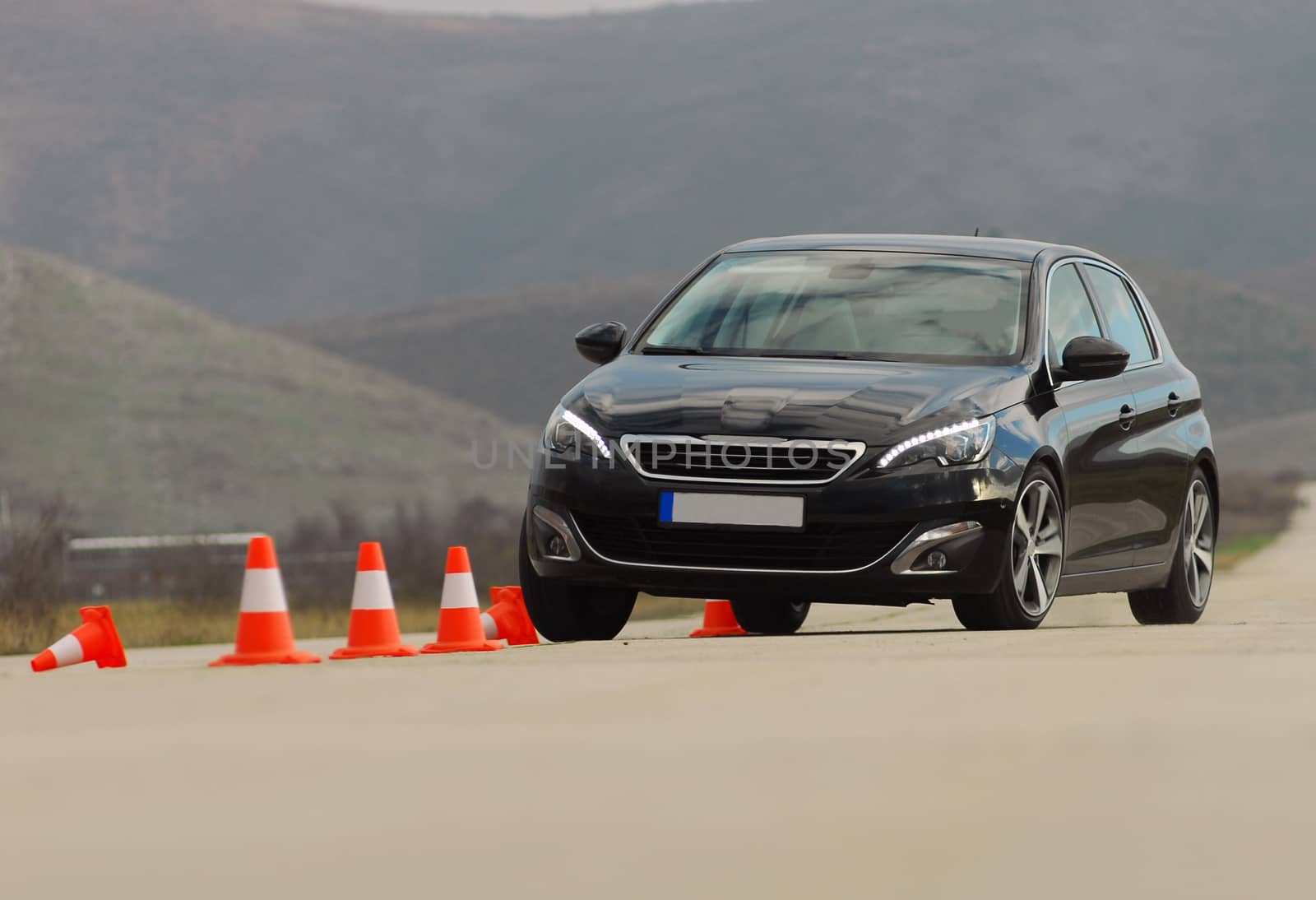 test drive a car at the test site with cones