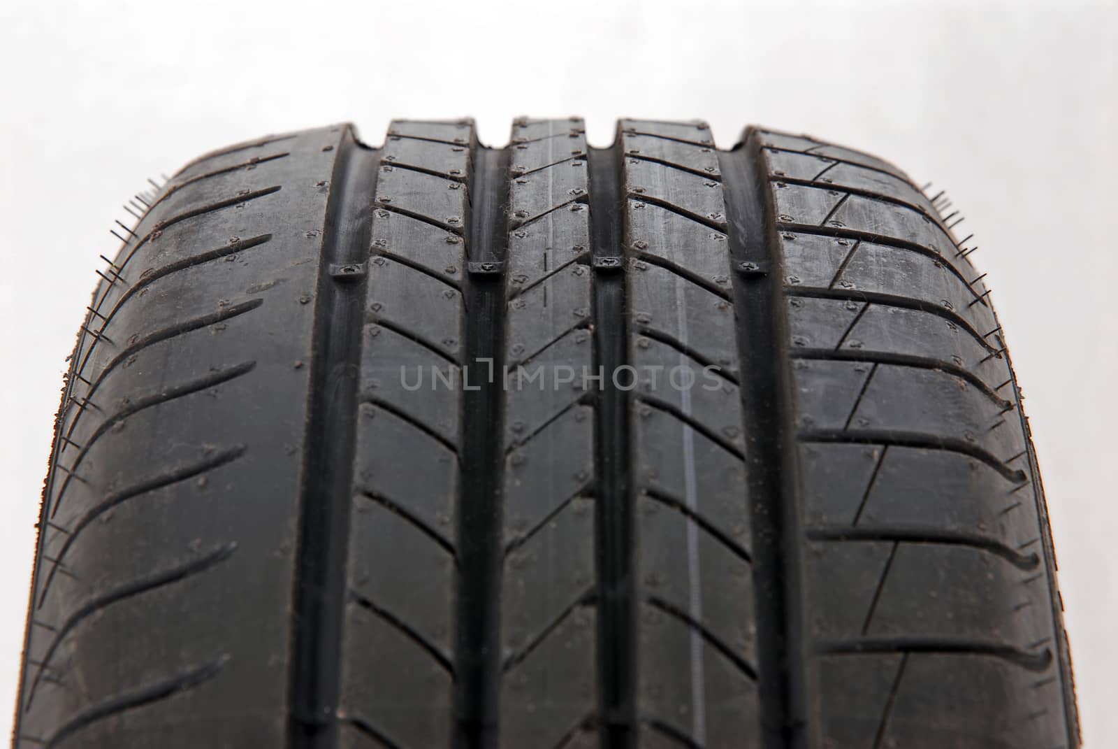 Fragment A brand new modern summer tire