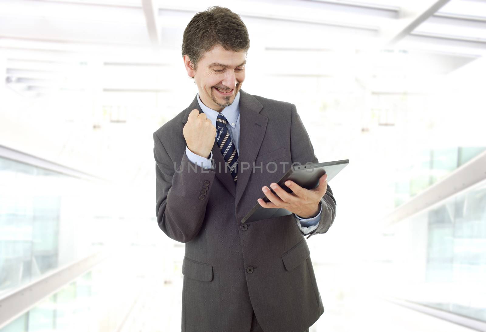 businessman using touch pad of tablet pc, at the office