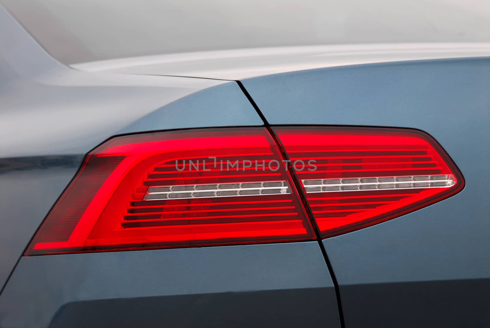 the tail lights on a luxury passenger car