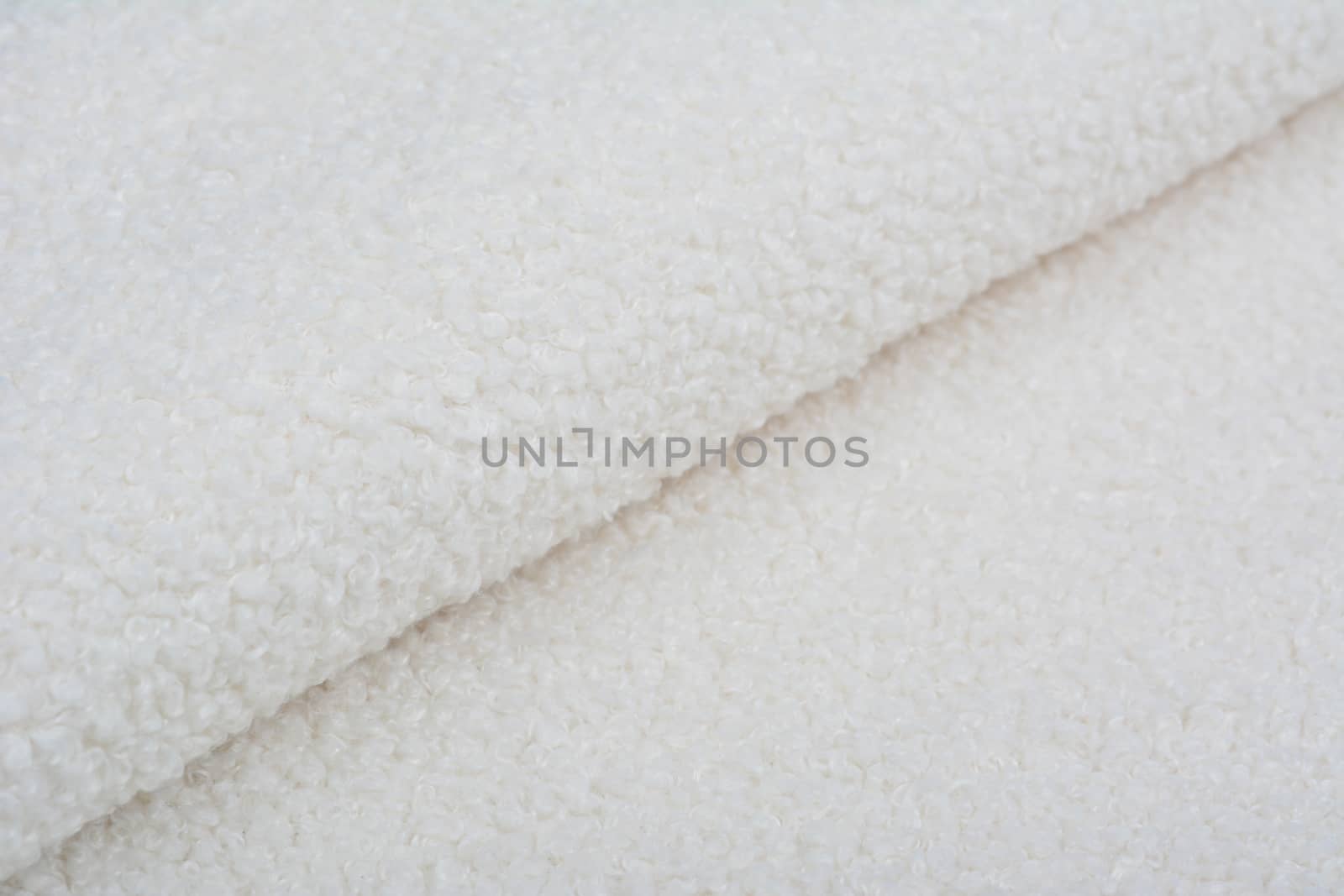 Abstract Artificial texture fur fabric, background, closeup. Fluffy material backdrop, kids toys faux fur.