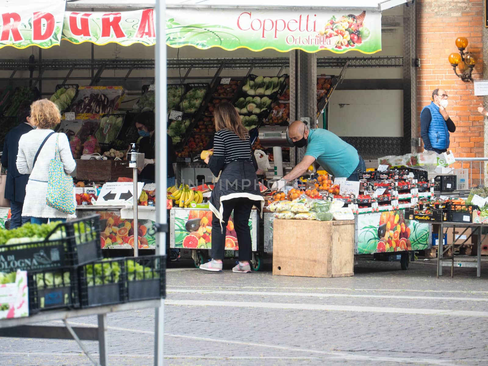 Cremona, Lombardy, Italy - 16 th may 2020 - People grocery shopp by verbano