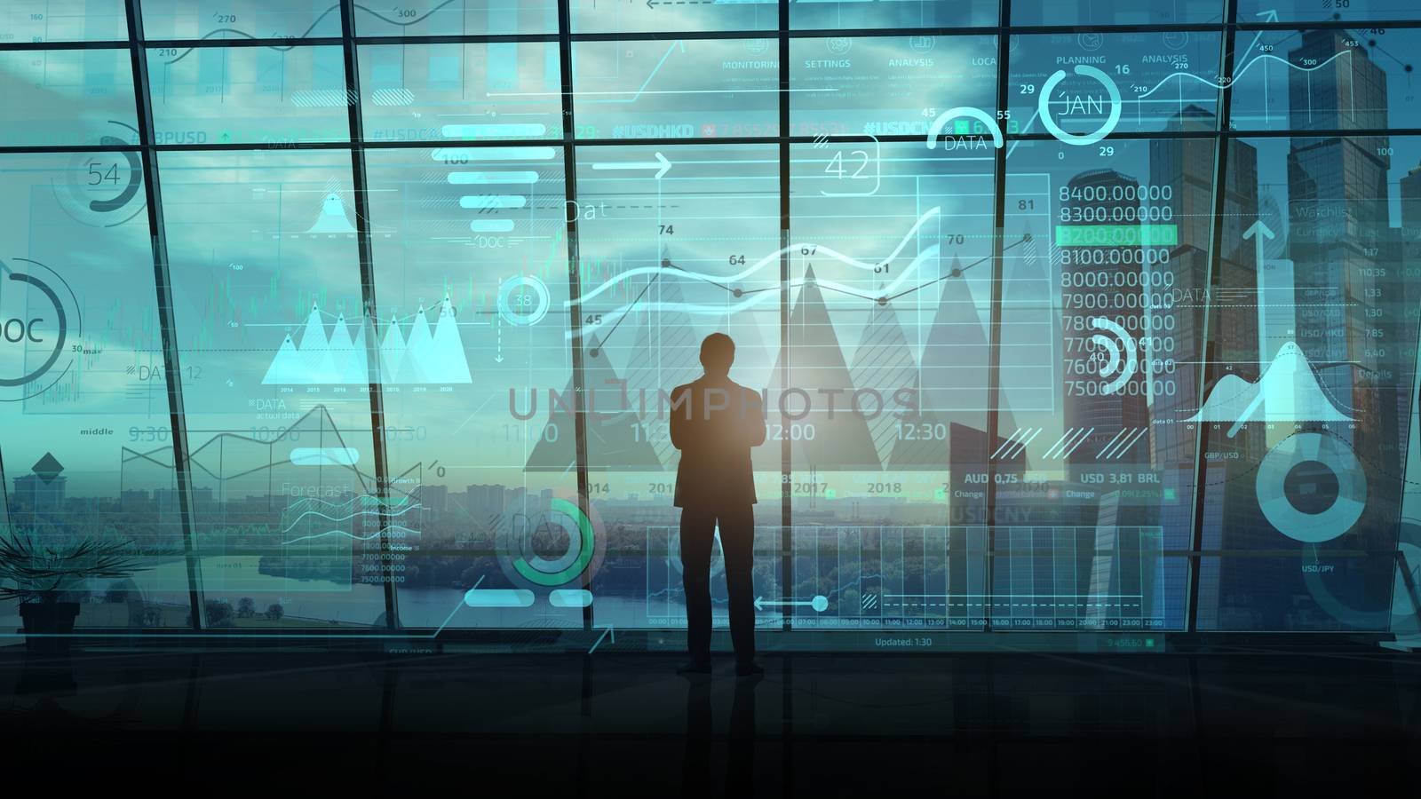 A silhouette of a businessman stands in a large office building in front of a large array of infographics.