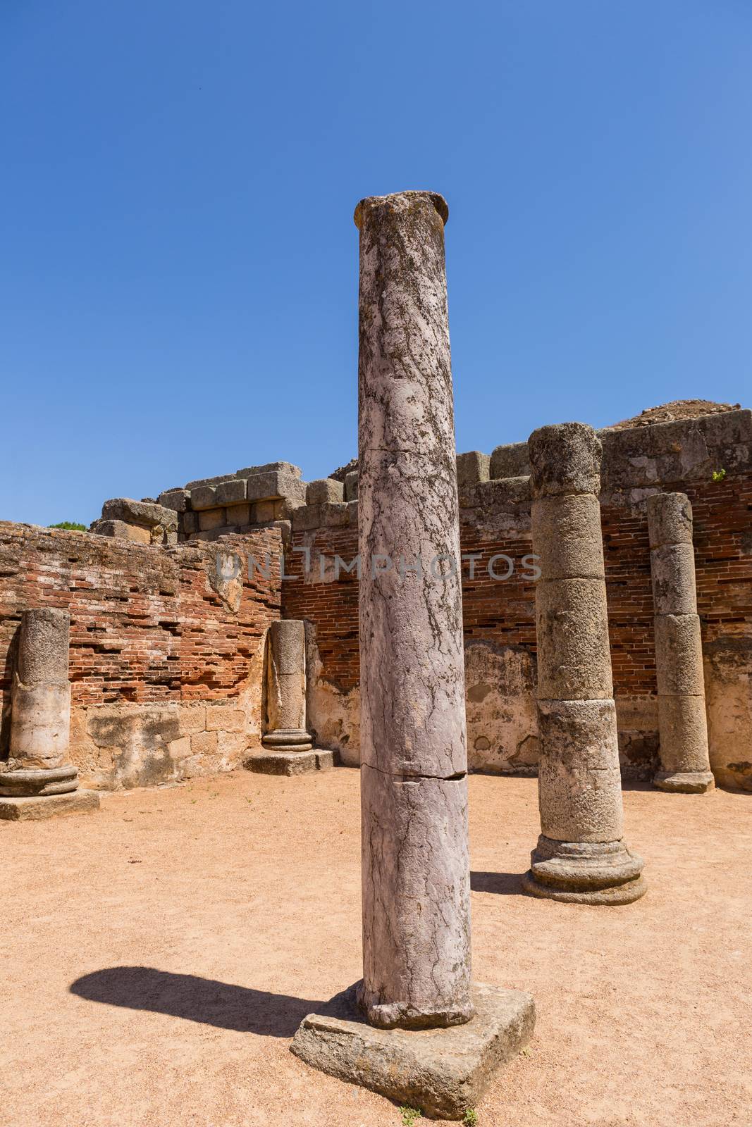 Old roman columns in the antique theater in Merida, Spain