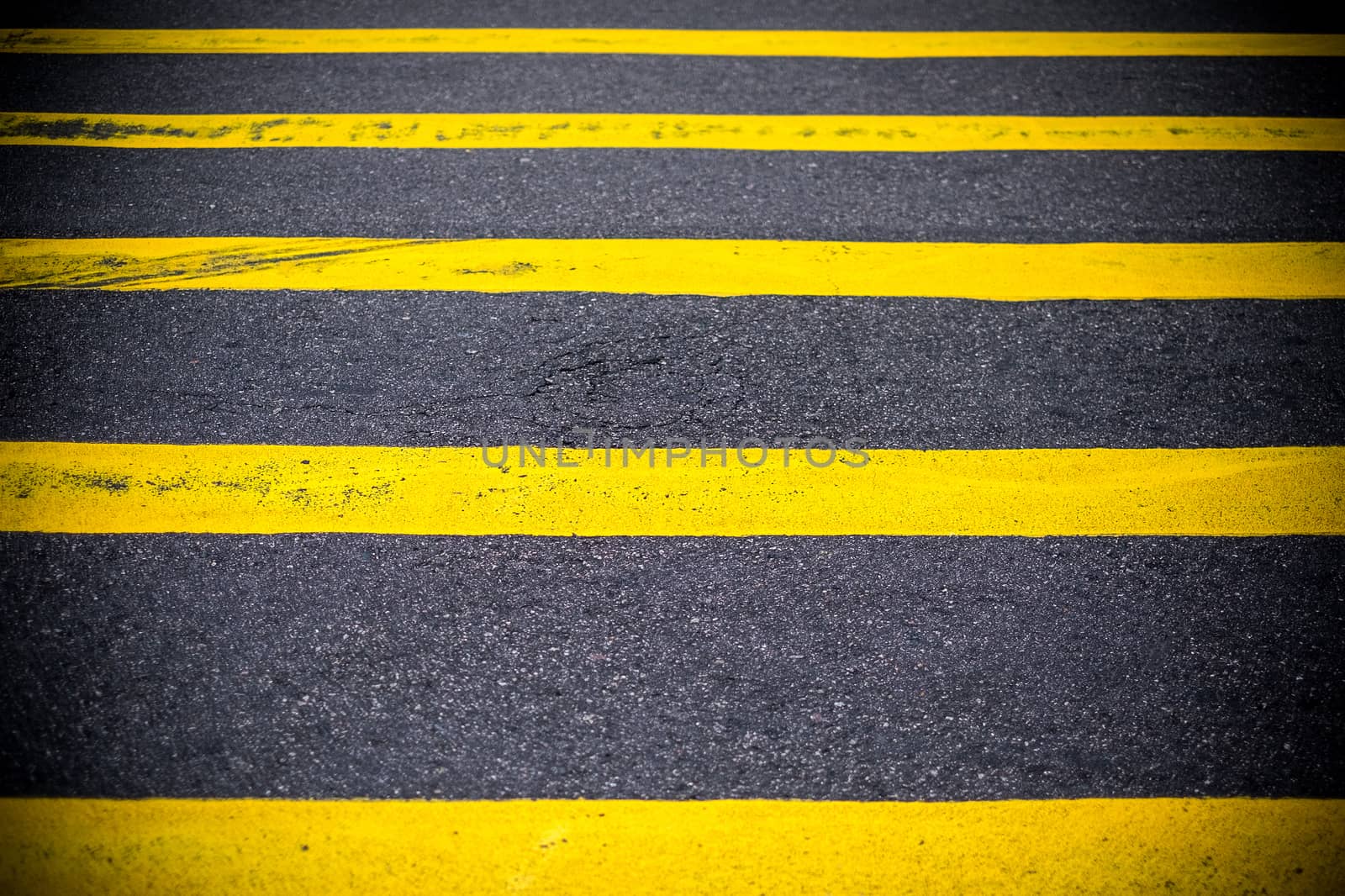 Road Marking Yellow Lines on asphalt