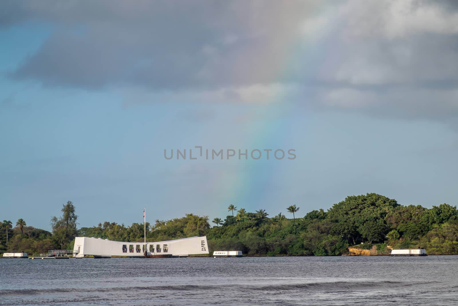 USS Arizona memorial under rainbow in Pearl Harbor, Oahu, Hawaii by Claudine