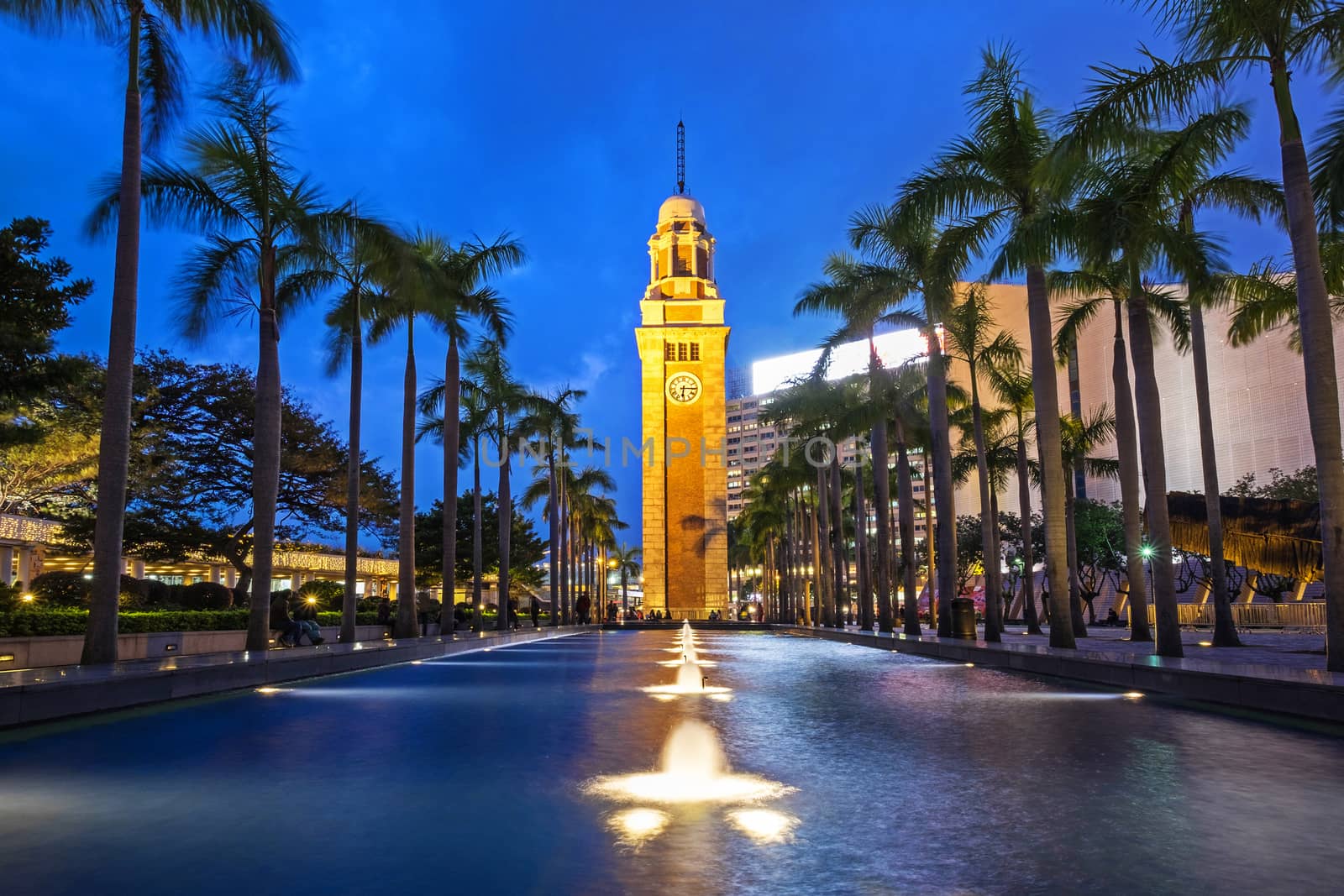 Night view Old Clock Tower in Hong Kong by Surasak