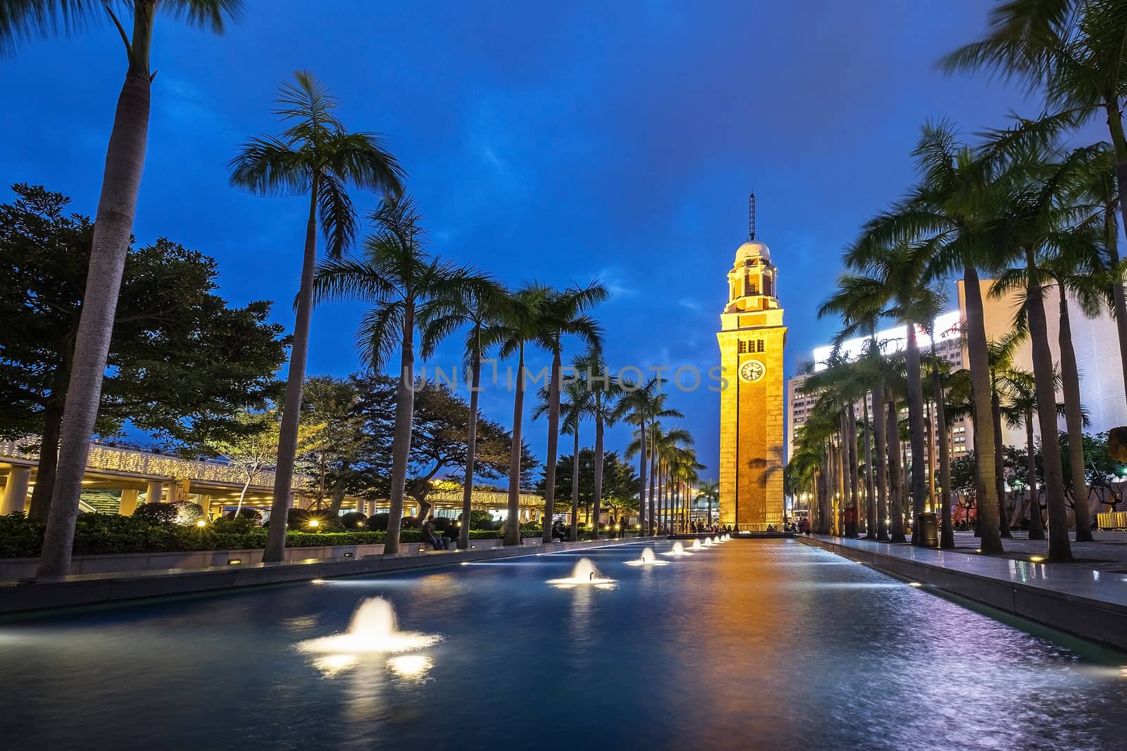 Night view Old Clock Tower in Hong Kong by Surasak