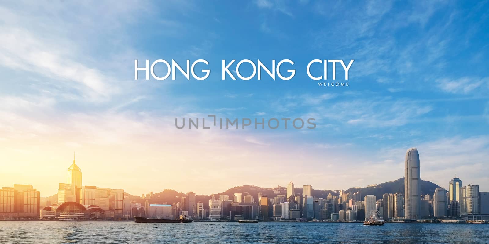 Hong Kong's Victoria Harbour in sunrise with text welcome to Hon by Surasak