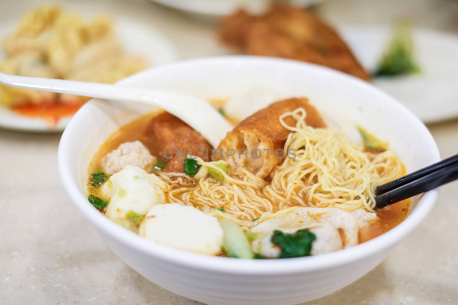 Noodle and dumpling close up in Hong Kong  by Surasak