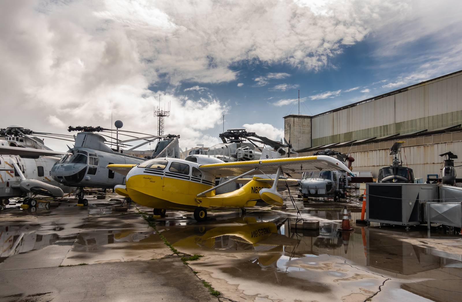 Group of helicopters outside Pearl Harbor Aviation Museum, Oahu, by Claudine